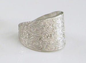 Open ornate ring
